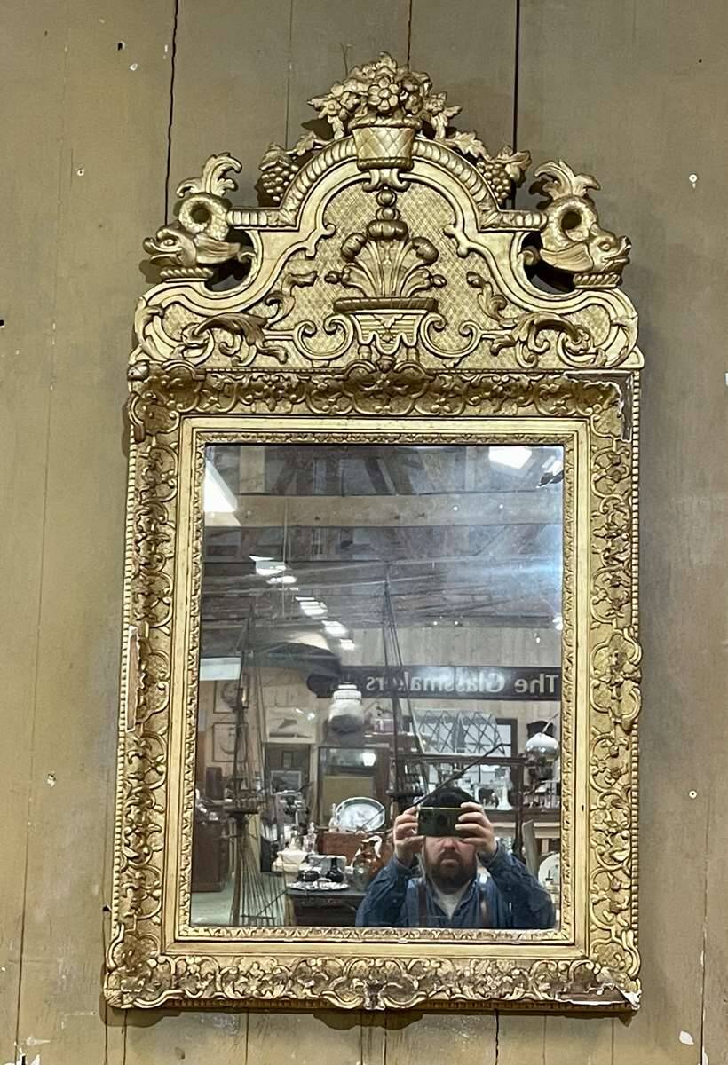 18th century Regency mirror in gilded wood