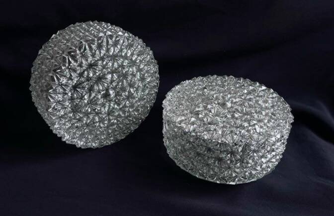 Pair of round vintage moulded glass ceiling lights.