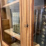 Old display case with bubbled glass