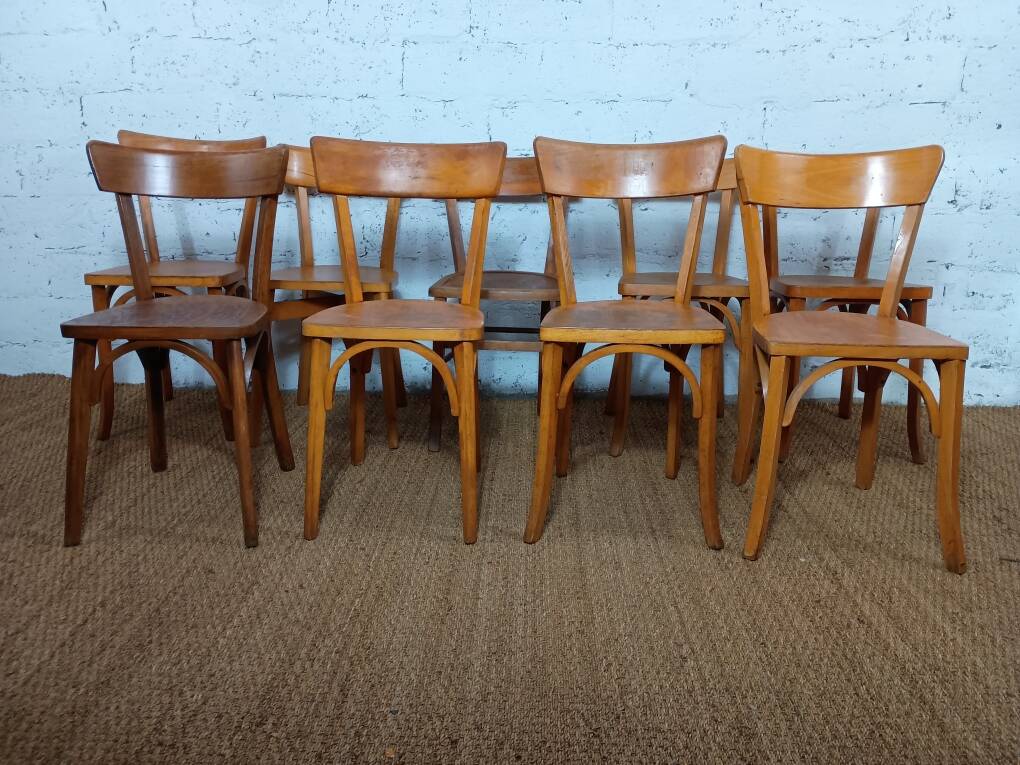 Set of 9 mismatched bistro chairs, 1950s.