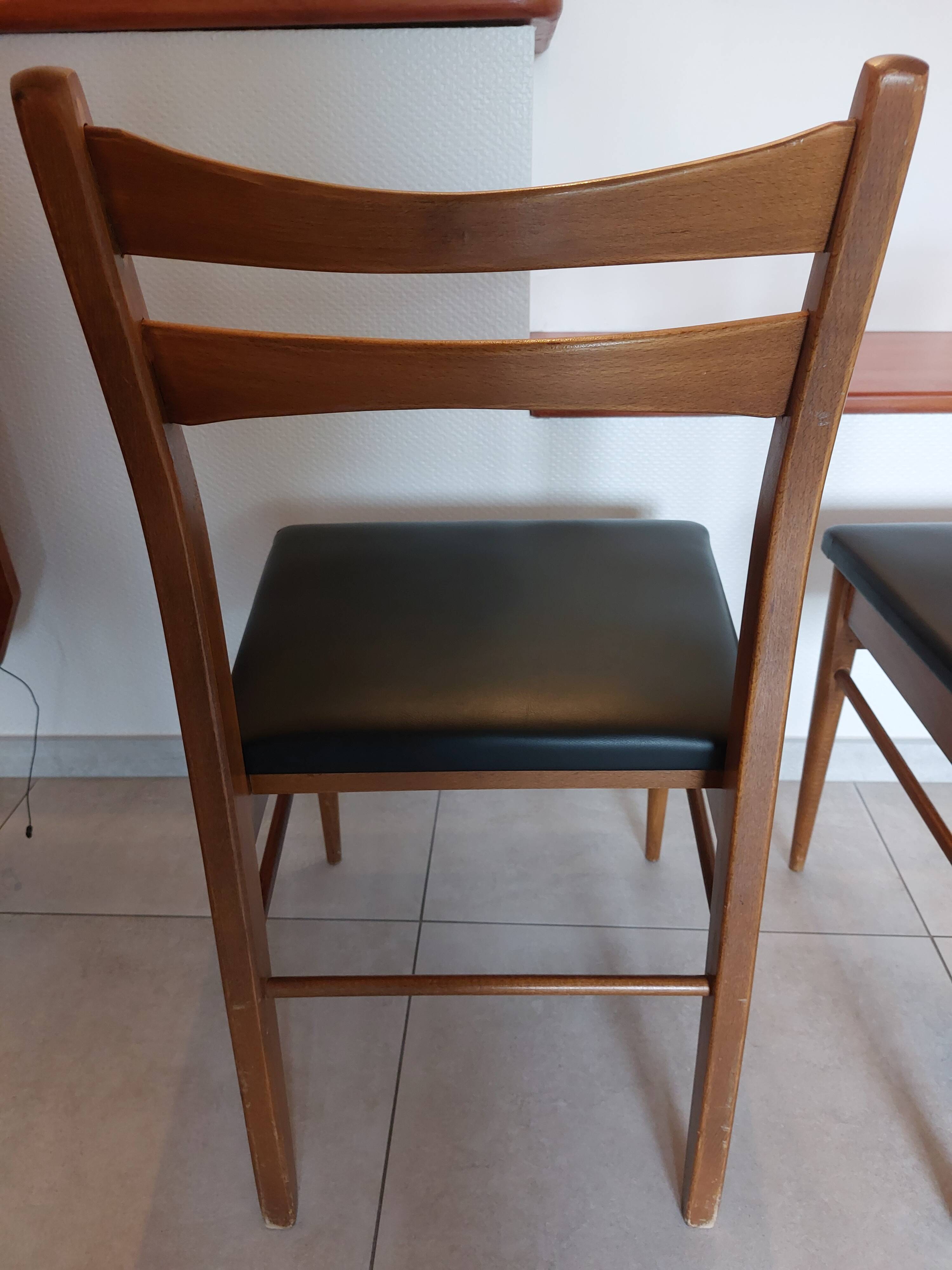 5 Scandinavian style chairs, wood and black faux leather.