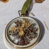 Domed frame of dried flowers