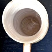Stoneware water jug, owl decoration, signature to be identified.