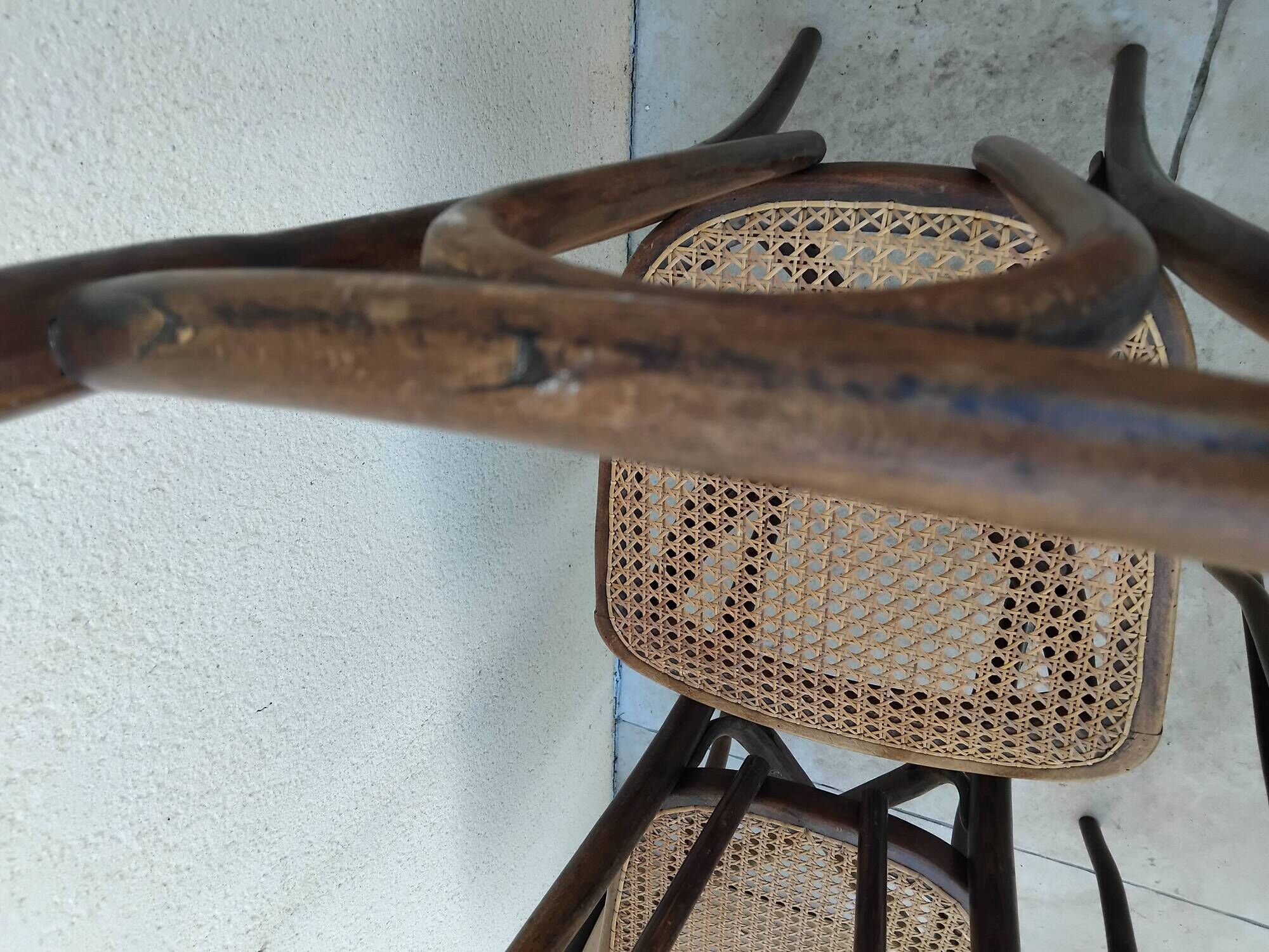 6 antique bistro chairs with curved wood and caning from 1900 L&H Cambier Frères