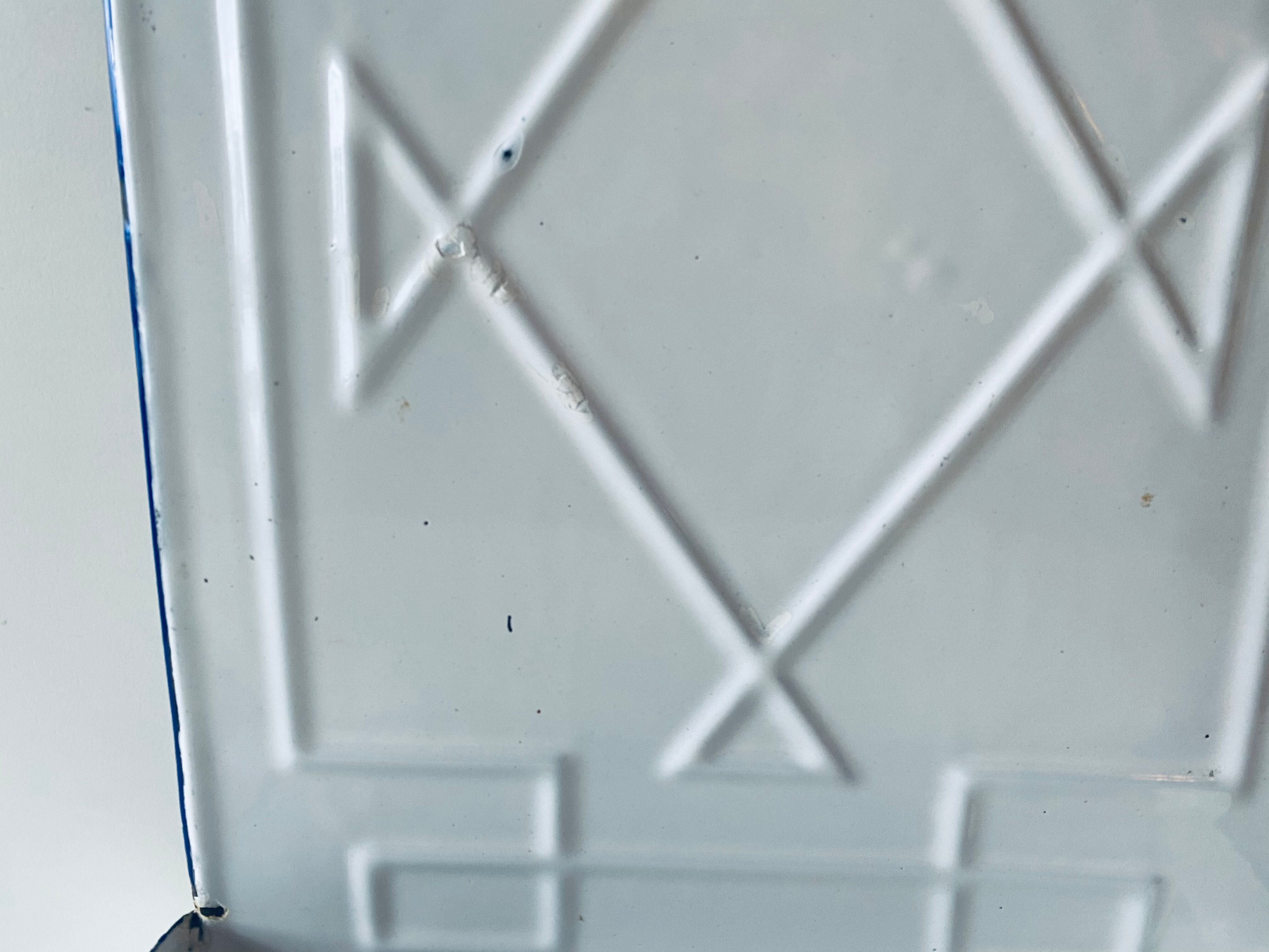 Old enamelled kitchen utensil display
