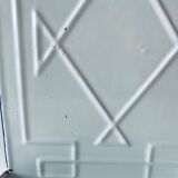 Old enamelled kitchen utensil display