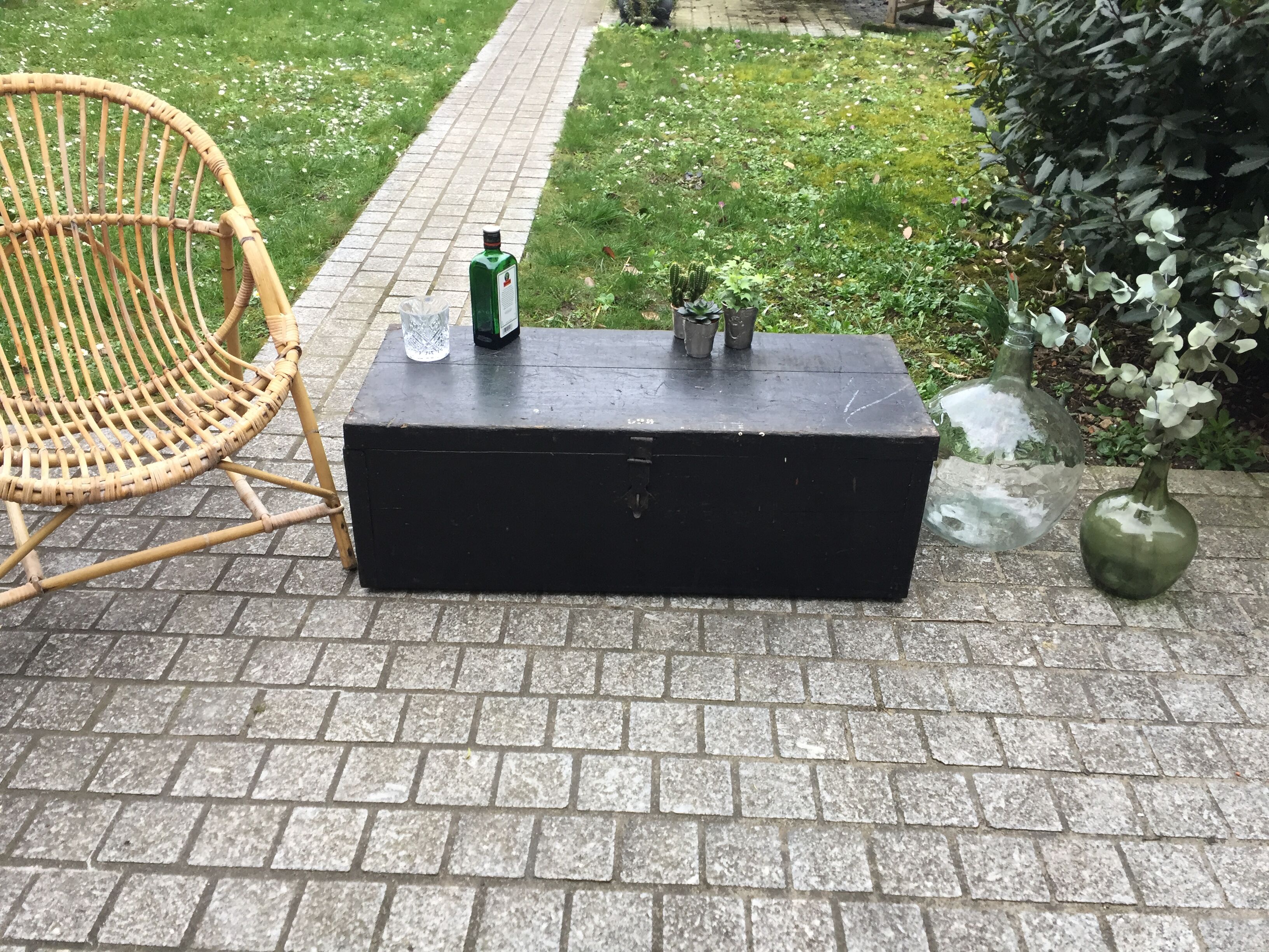 Old chest or wooden trunk black patina