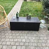 Old chest or wooden trunk black patina