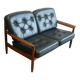Scandinavian sofa in teak and green leather