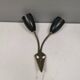 Older wall lamp with black metal shades and brass bend ‘arms’