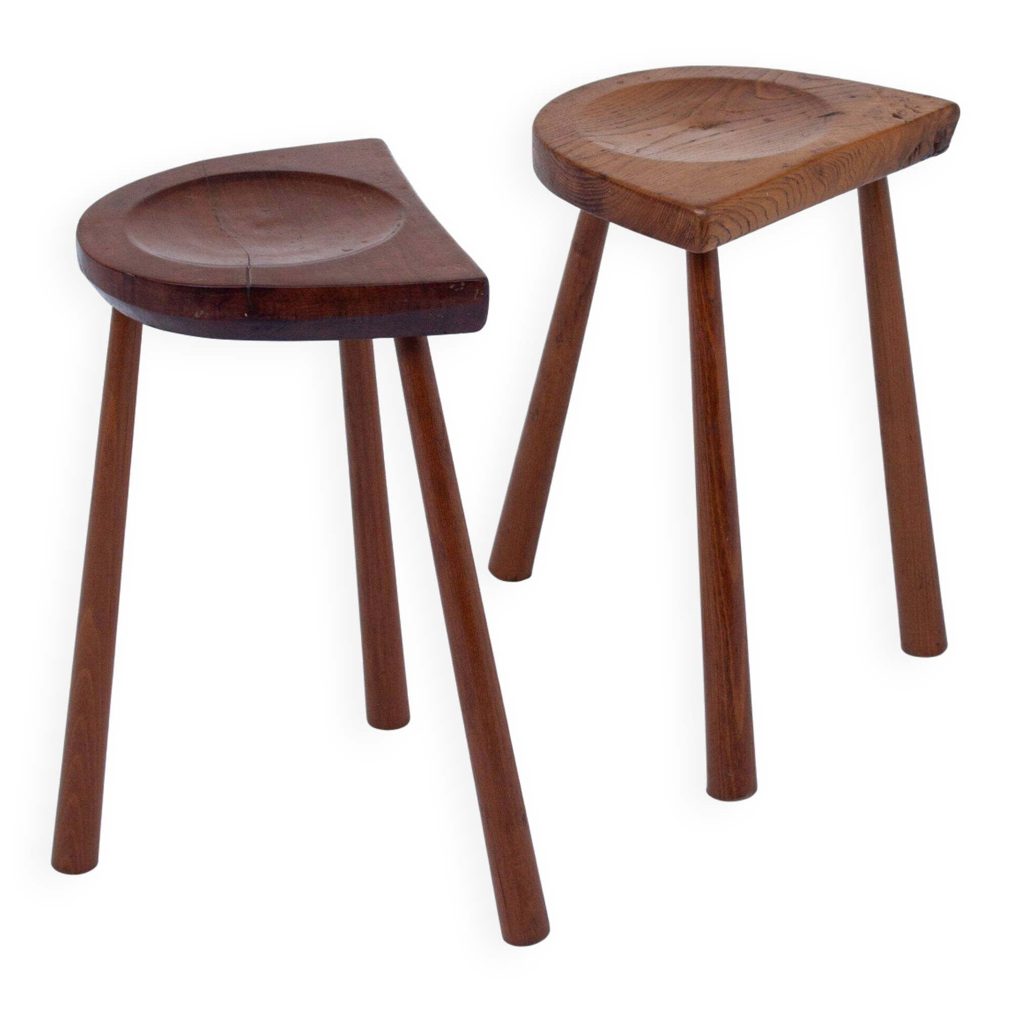 Set of two hand-carved wooden stools with sculpted seats