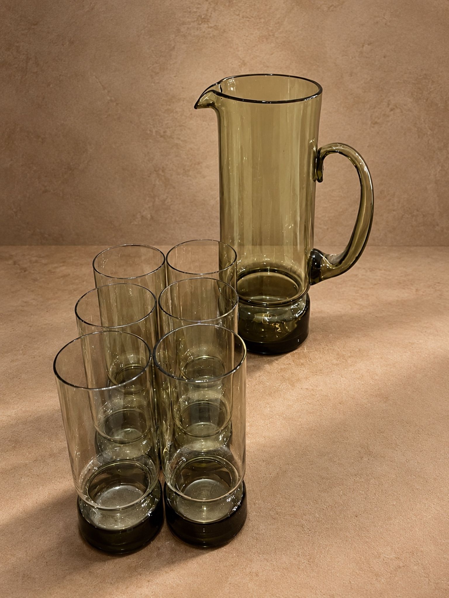 Vintage service in olive green tinted glass, Czechoslovakia, circa 1970.