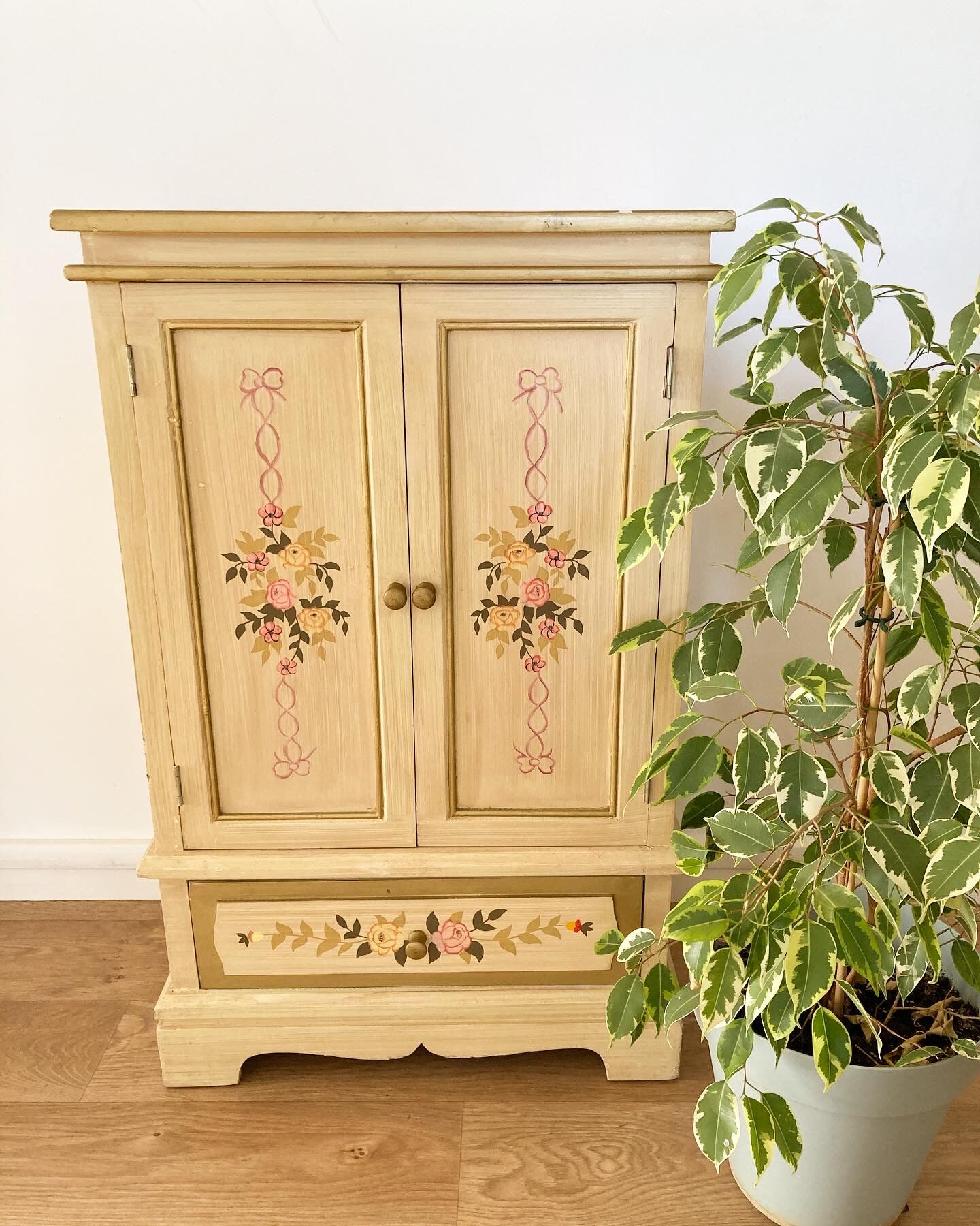 2-door flowered wooden cabinet