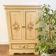 2-door flowered wooden cabinet