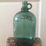 Green glass whiskey bottle