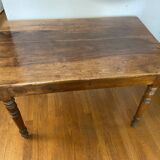 Walnut bistro table, feet turned.