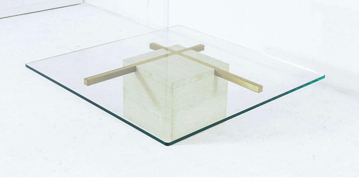Coffee table with travertine gold-plated cross base and glass top