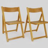 Pair of vintage folding chairs in beech and canework. Italy 70s