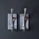 Pair of vintage cast aluminum coat hooks
