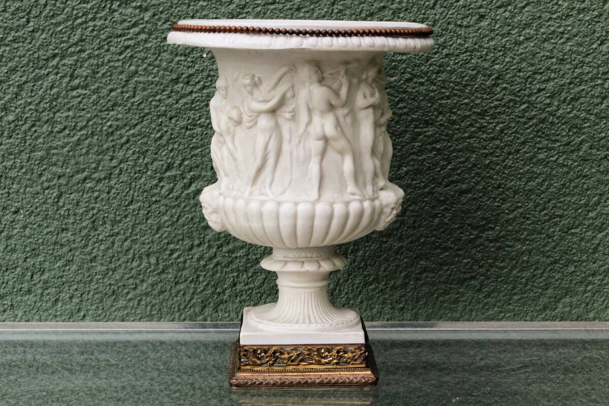 Pair of Medicis Borghese vases in porcelain biscuit and brass.