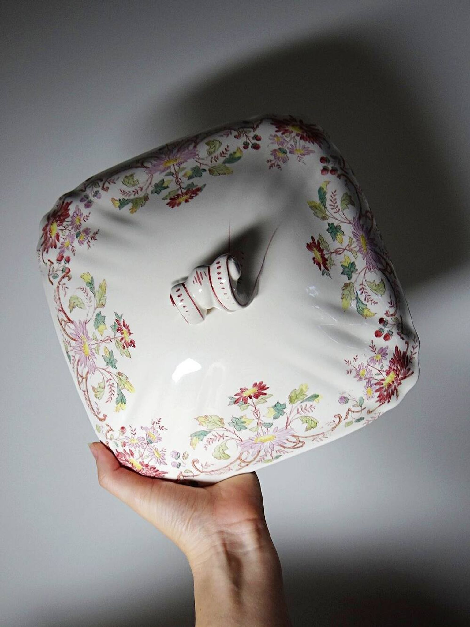 Antique Longchamp soup tureen/vegetable dish with polychrome daisies in ironstone.