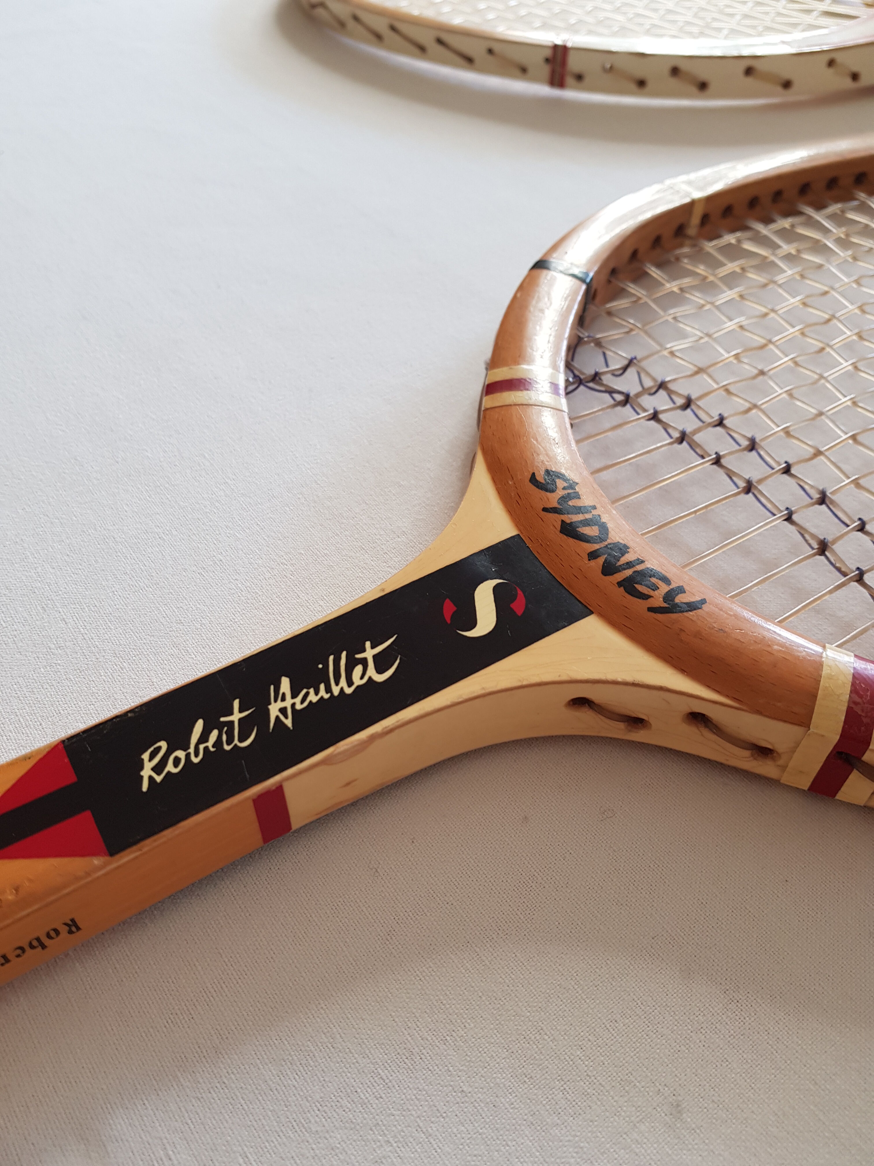 Two vintage collector tennis rackets, "Robert Haillet" and "Team de France"