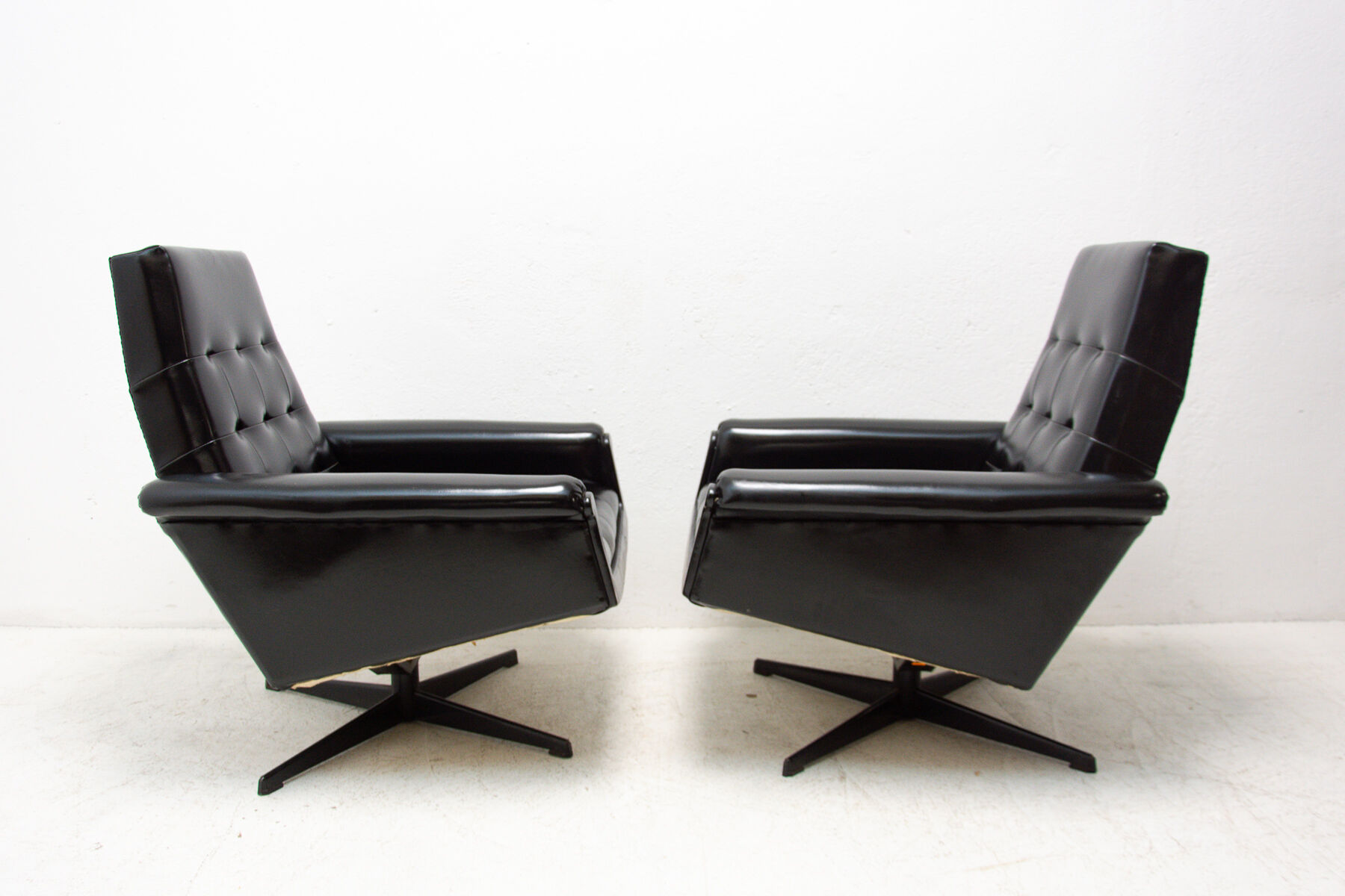 Pair of leather swivel armchairs from UP Zavody, 1970´s