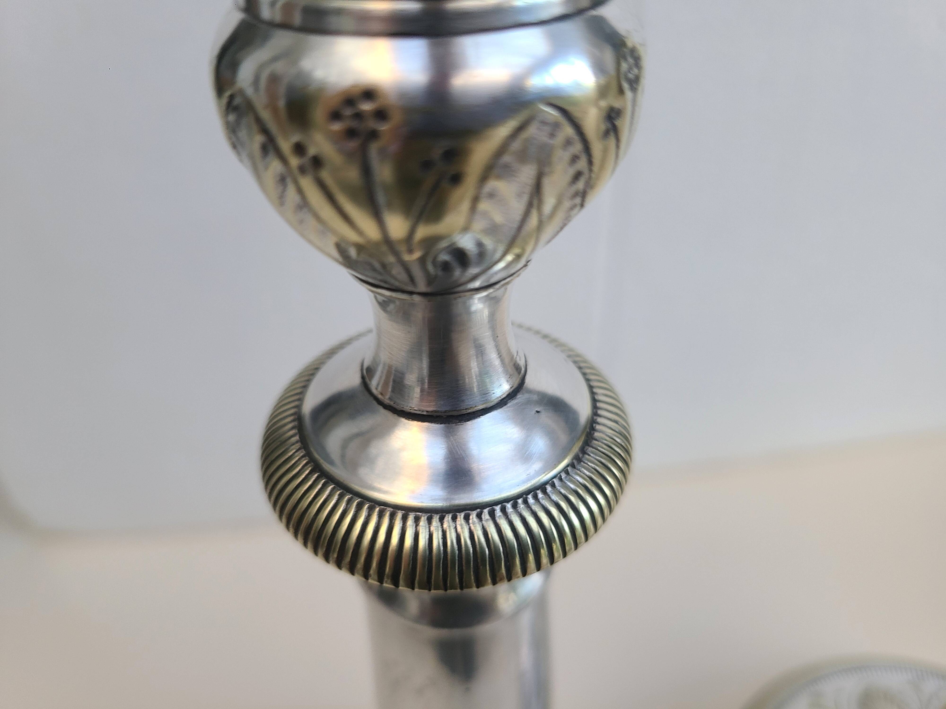 Antique silver-plated metal candlesticks