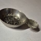 Antique silver-plated metal tastevin with tavern scene decor and shell handle