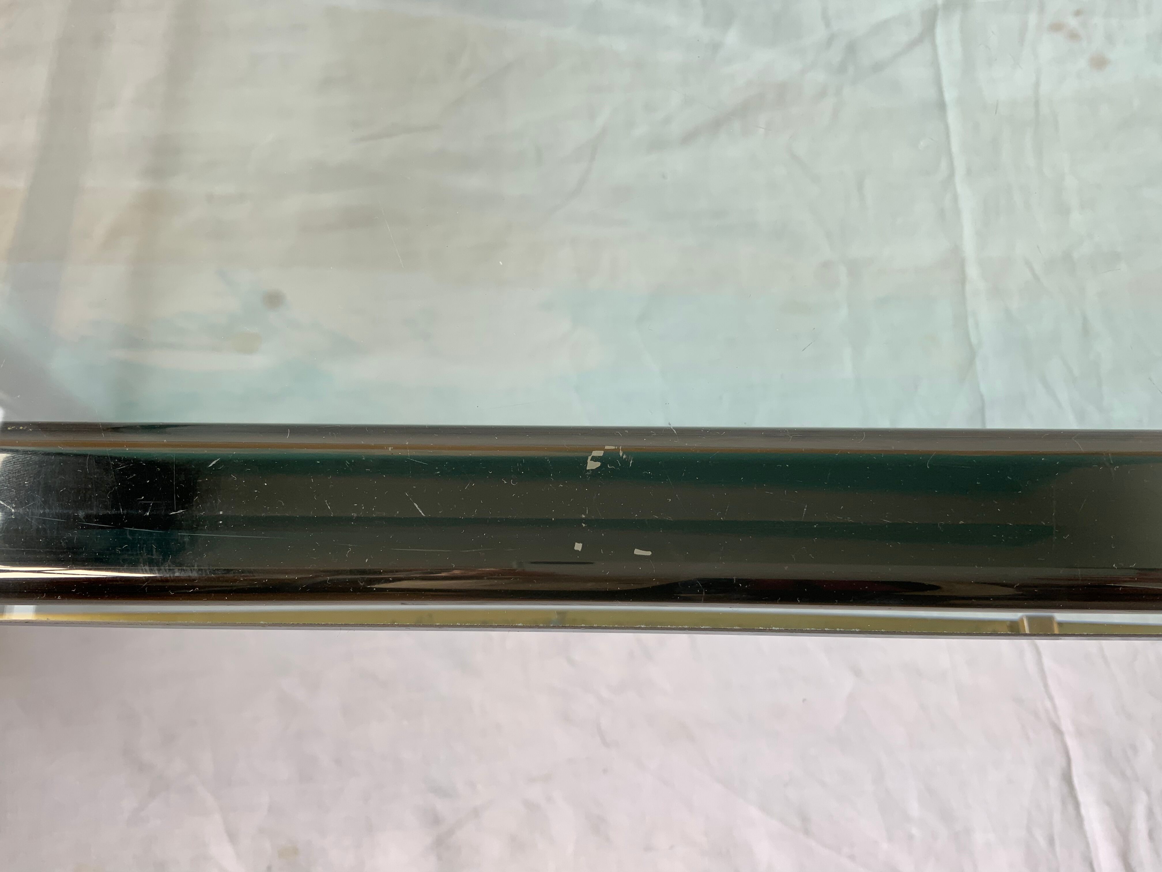 Glass and brass coffee table