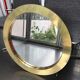 Miroir rond en laiton acier doré 66 x 66 cm