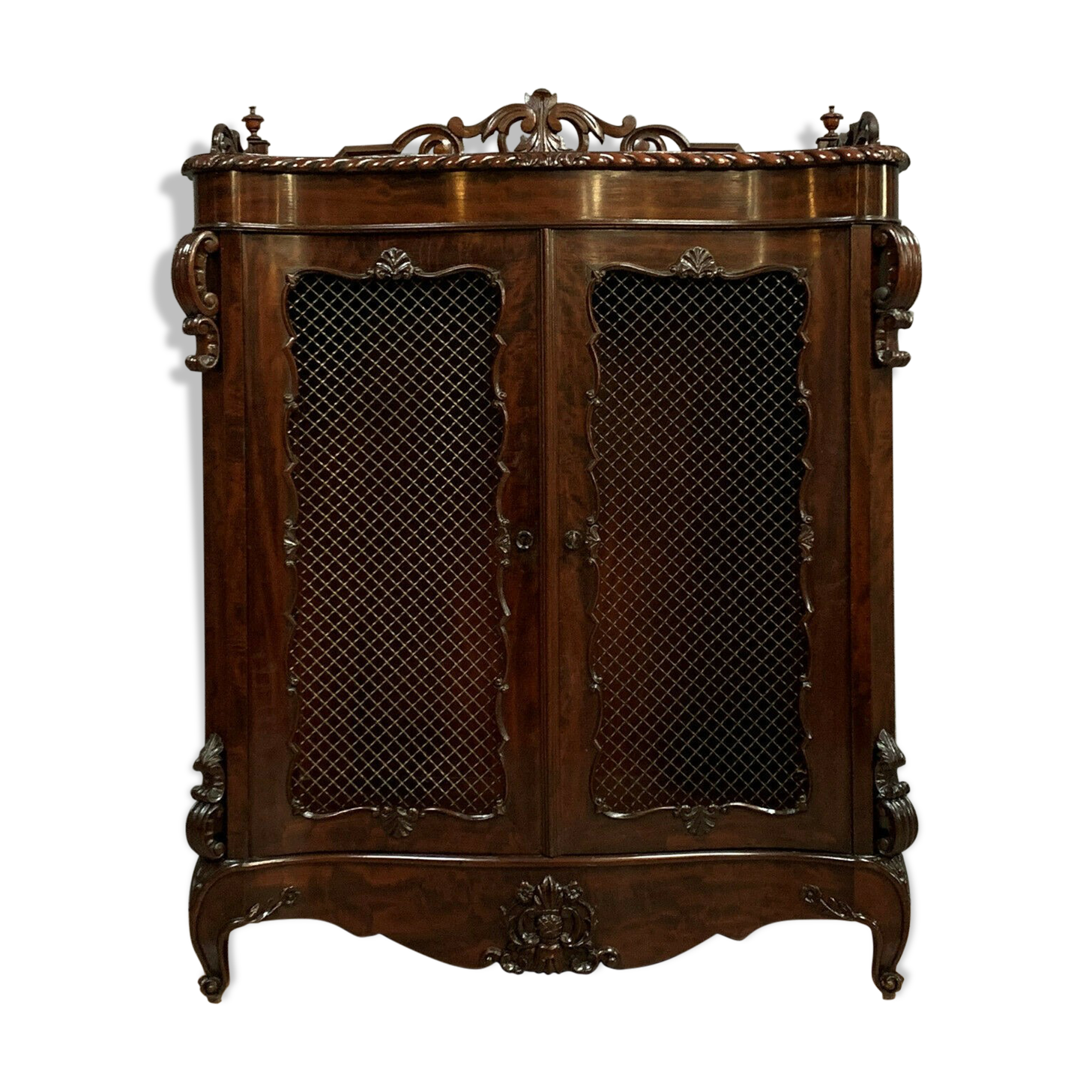 Exceptional furniture for this Napoleon III period living room library in curved mahogany shape