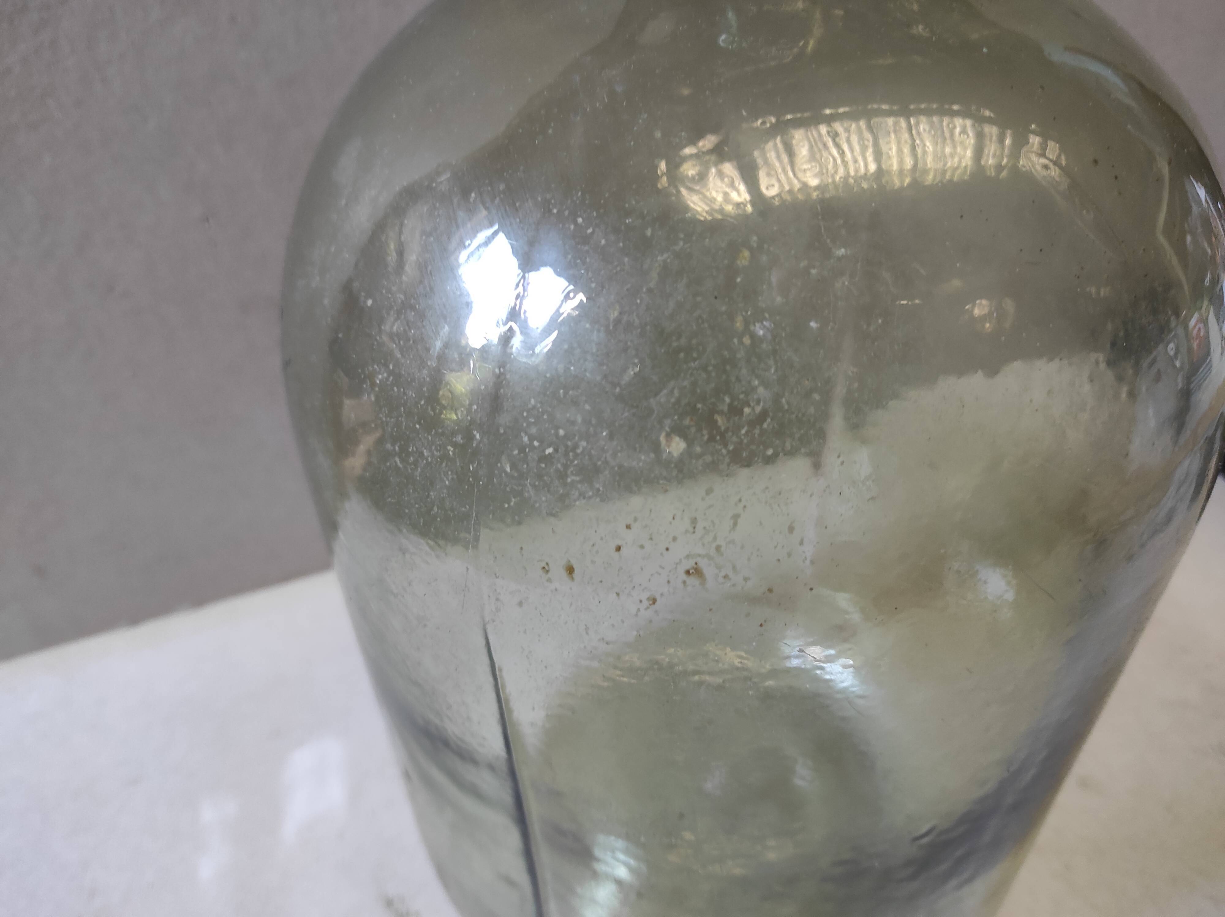Vintage former lady-jeanne in green glass 10 L broken neck