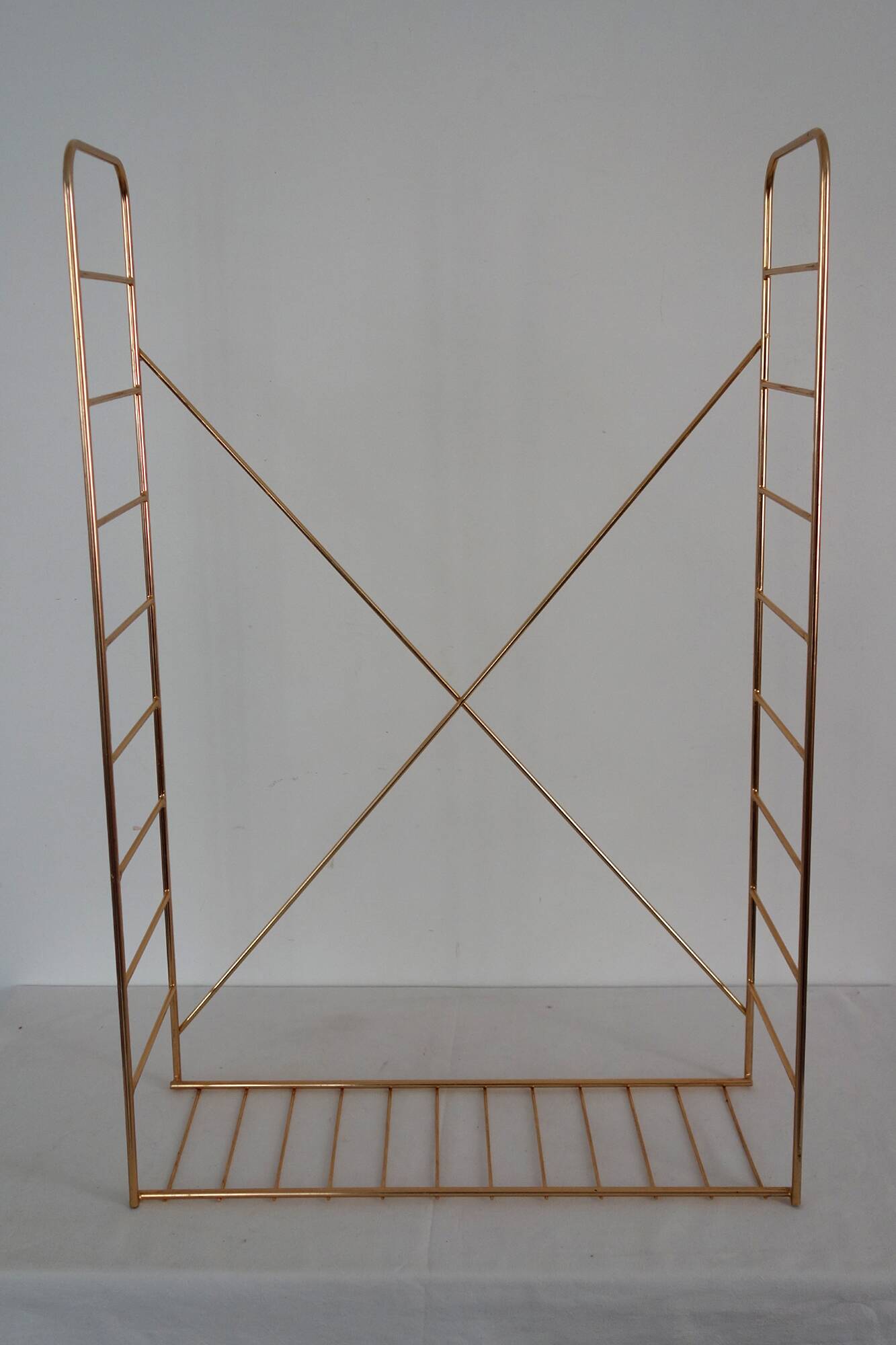 String wall shelf in gold metal and wood from the 60s