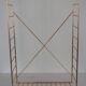 String wall shelf in gold metal and wood from the 60s