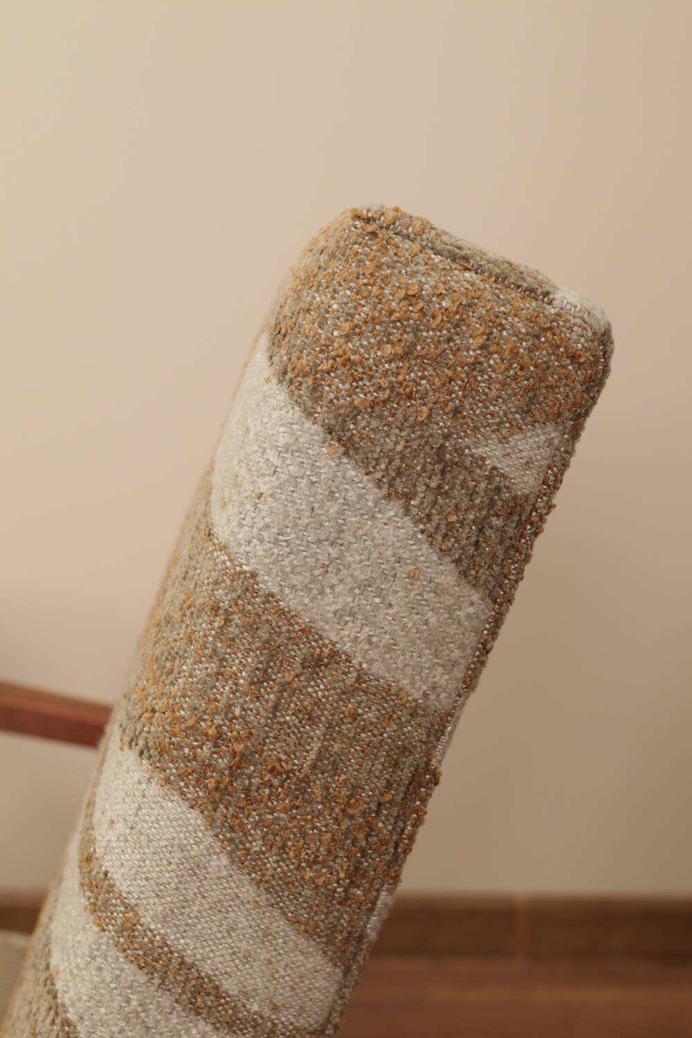 Pair of vintage lounge chairs in brown jacquard fabric and wood.