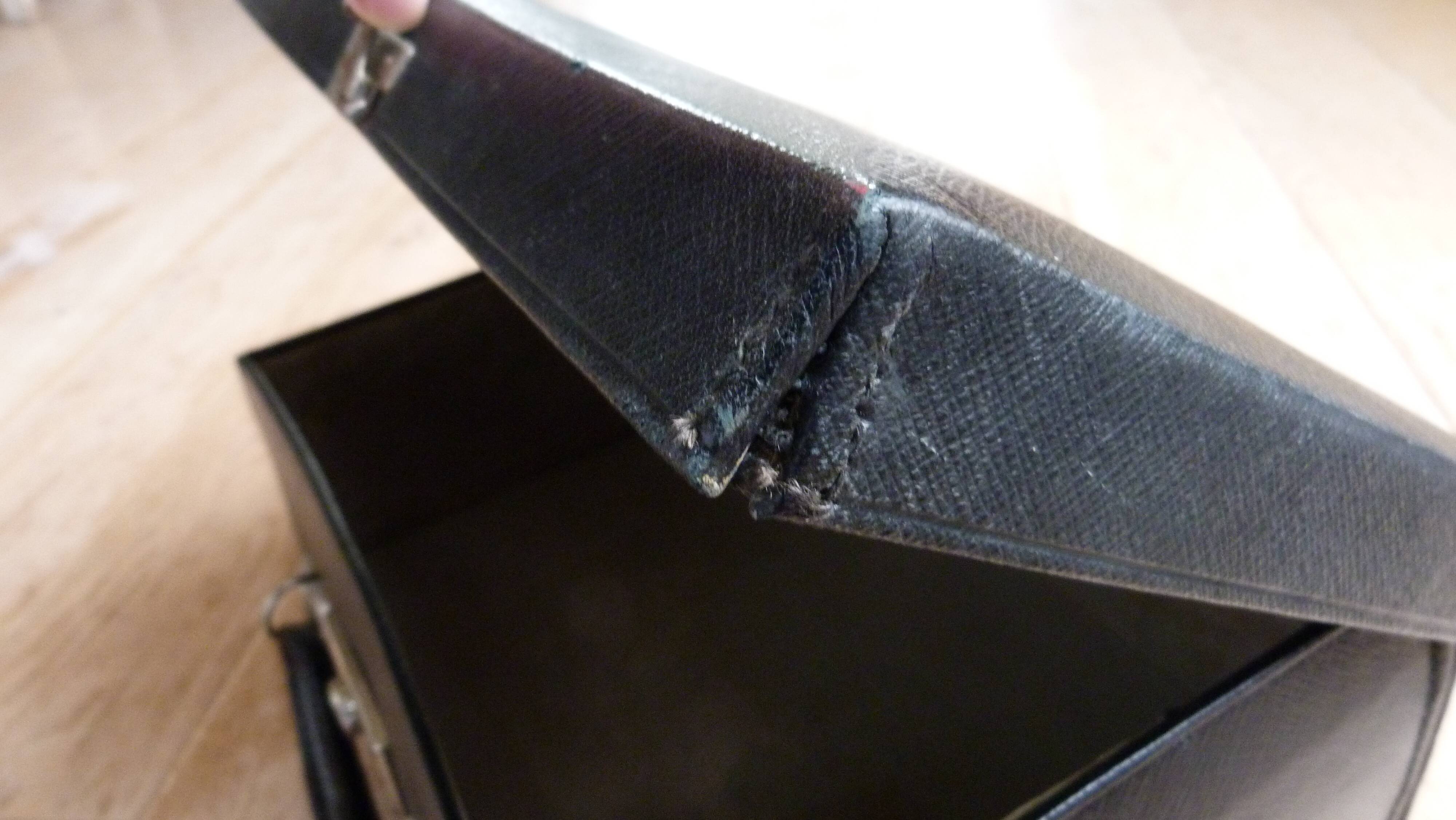 Old black suitcase
