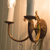 Old brass wall lamp with grapevines