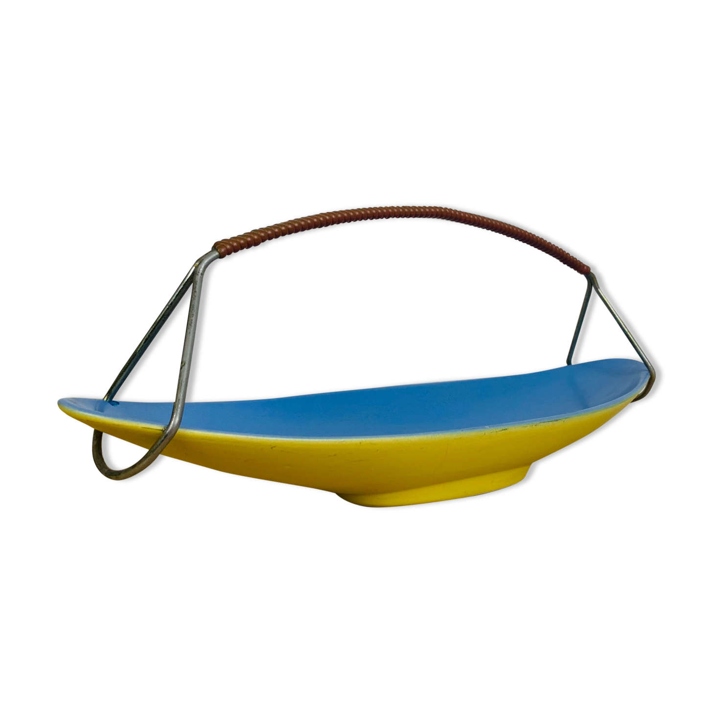 Empty ceramic shuttle pocket from the 50s