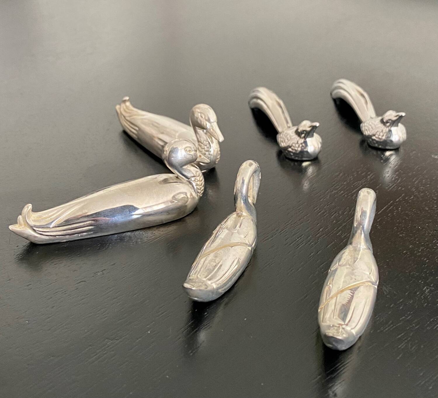 6 various animal shaped knife holders in silver metal