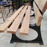 Garden bench with old cast iron legs