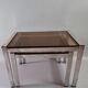 Vintage nesting tables from the 1970s, chrome and smoked glass, mid-century modern.