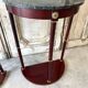 Paire de consoles demi-lune style Empire