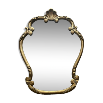 Old mirror in gilded wood