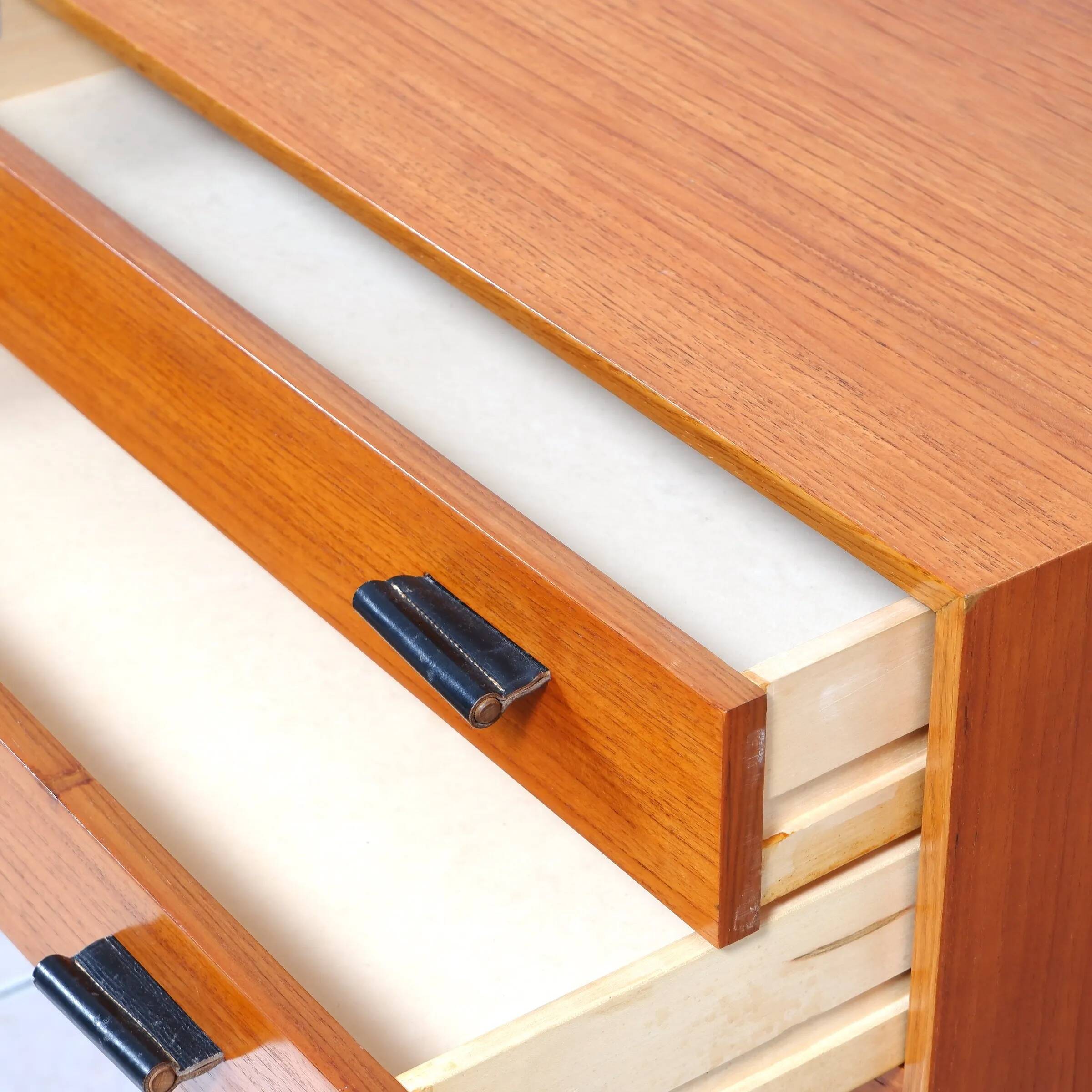 Swedish teak sideboard with leather handles