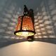 Pair of rattan and cane lantern wall lights. 1950s-60s