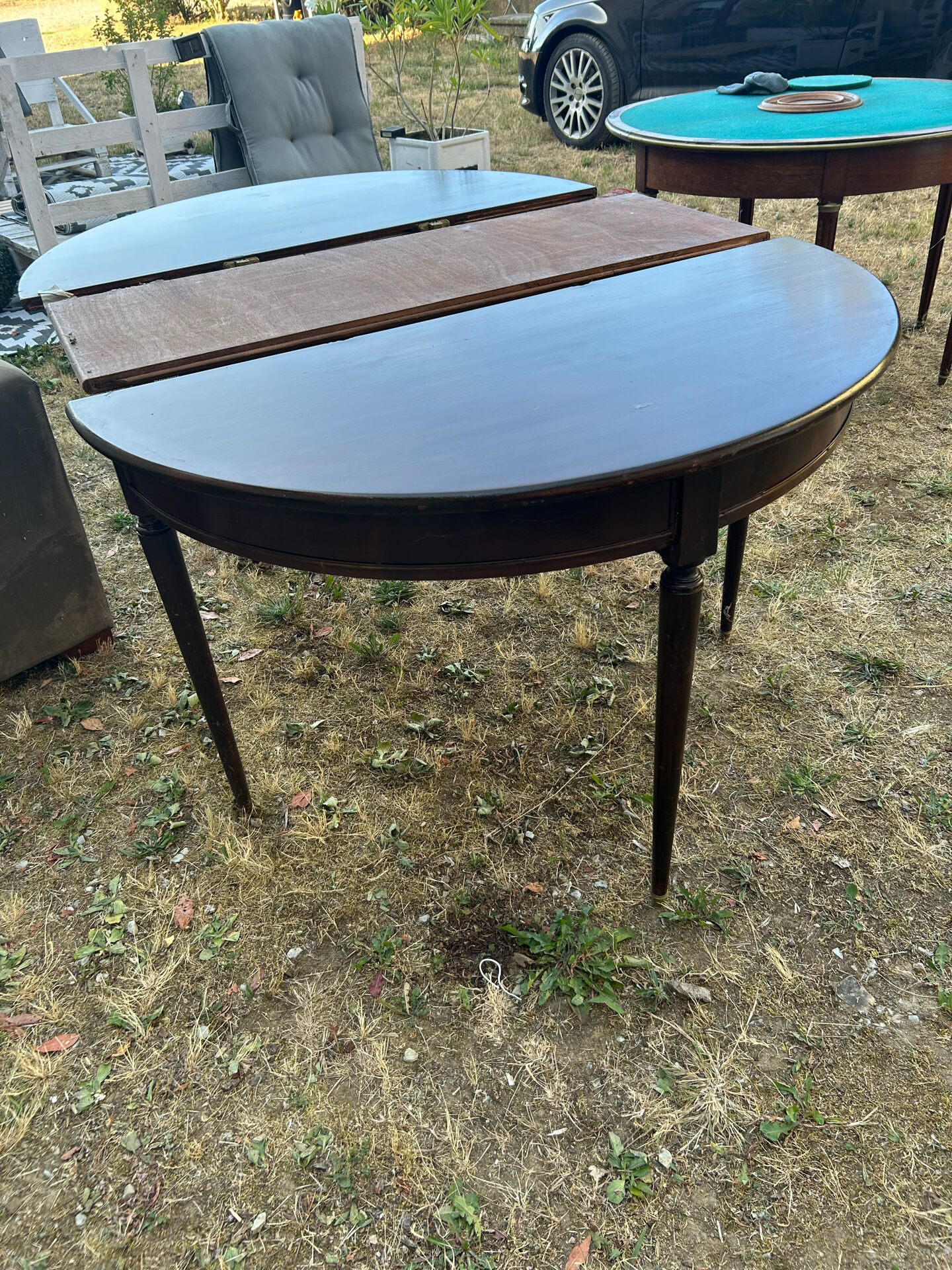 Half-moon table in mahogany, Louis XVI style.