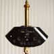 "Pique candle" double fire floor lamp in gilded bronze