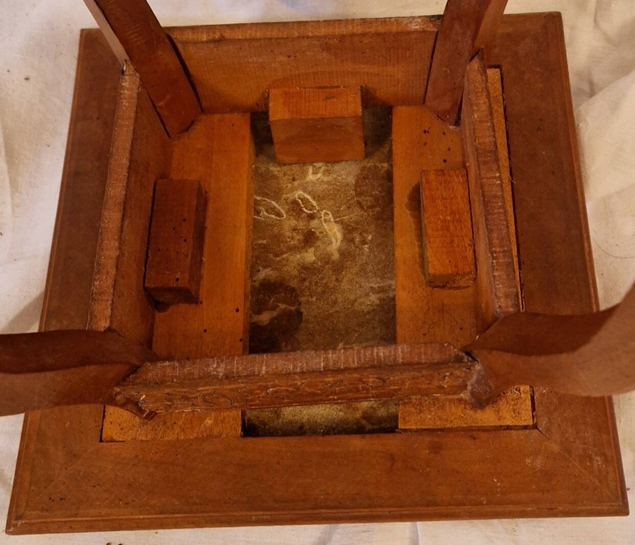 Antique Art Nouveau pedestal table with carved wood and marble top.
