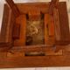 Antique Art Nouveau pedestal table with carved wood and marble top.